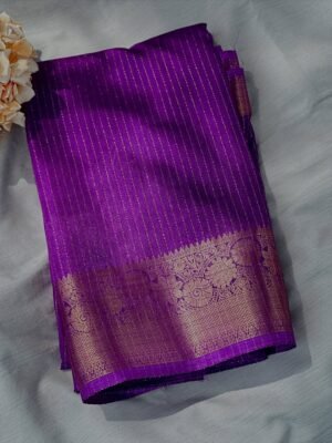 Stunning silk saree in a rich royal purple shade 💜 with elegant golden zari stripes & intricate Royal Purple Silk Saree